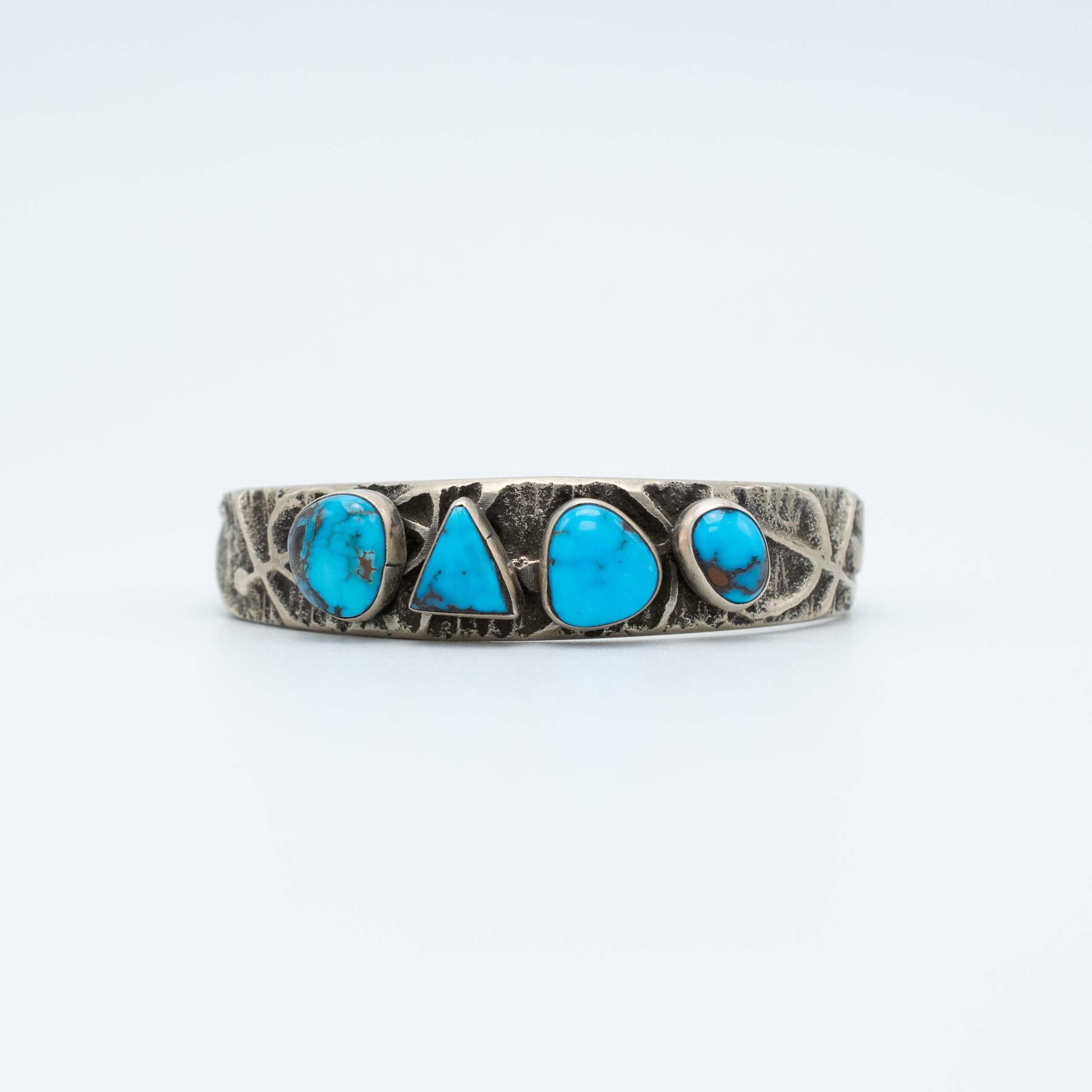 Aaron Anderson (Navajo) Tufa Cast Bracelet in Sterling Silver with Turquoise